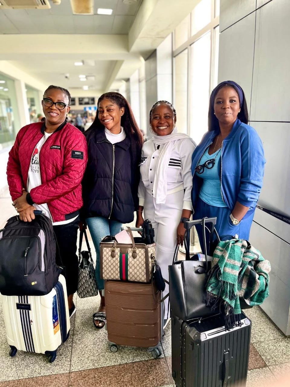 Travellers with luggage at the airport before departure